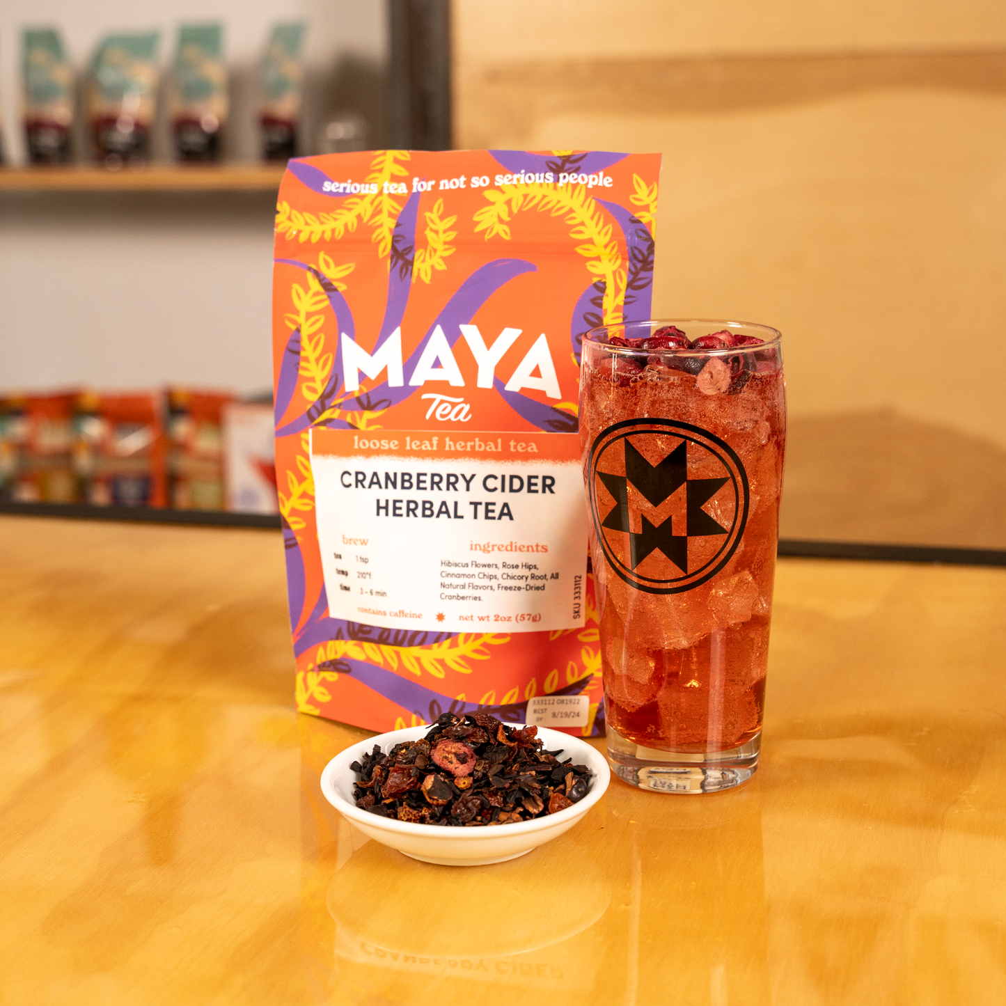 Cranberry cider tea, package, and cup of cranberry cider punch